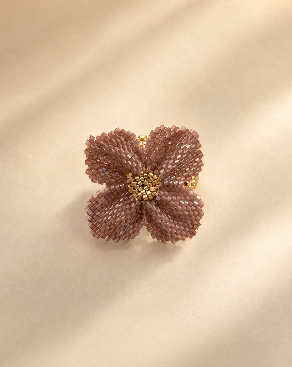 Damiana Violet Ring, handwoven violet Miyuki bead flower ring with gold center by Anne Sidora Poetry Atelier, Los Cabos