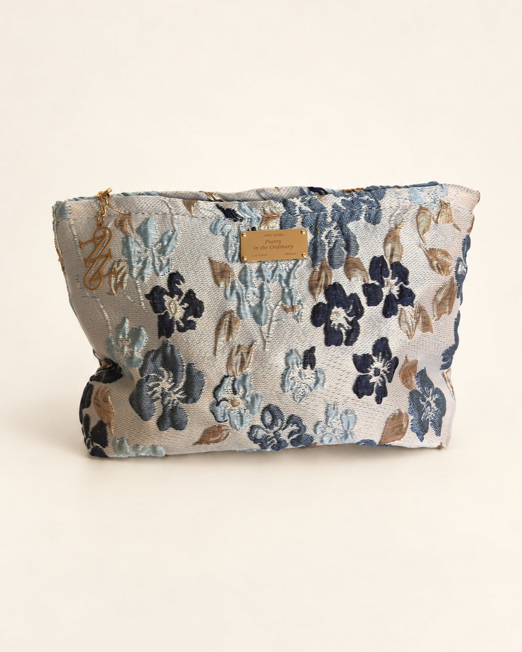 Flor de Luna pouch by Anne Sidora, front view, grey blue and gold flowers