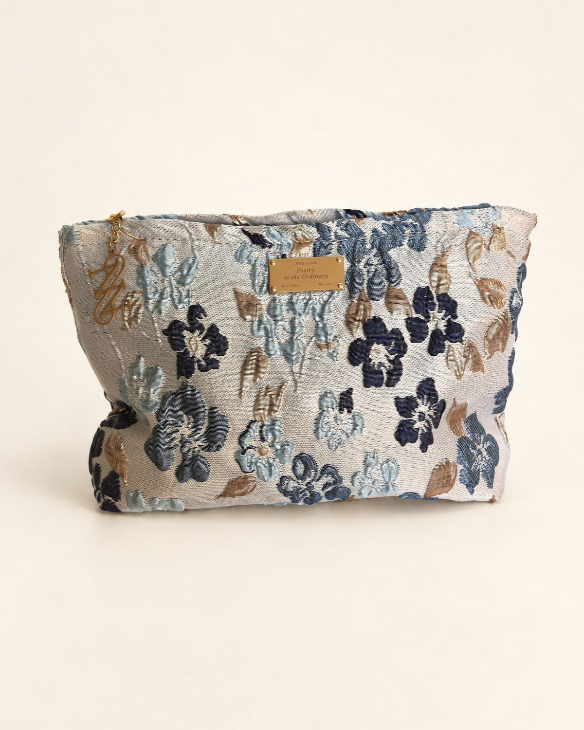 Flor de Luna pouch by Anne Sidora, front view, grey blue and gold flowers