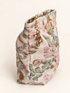 Flor de Sol Pouch side view with gold monogram charm