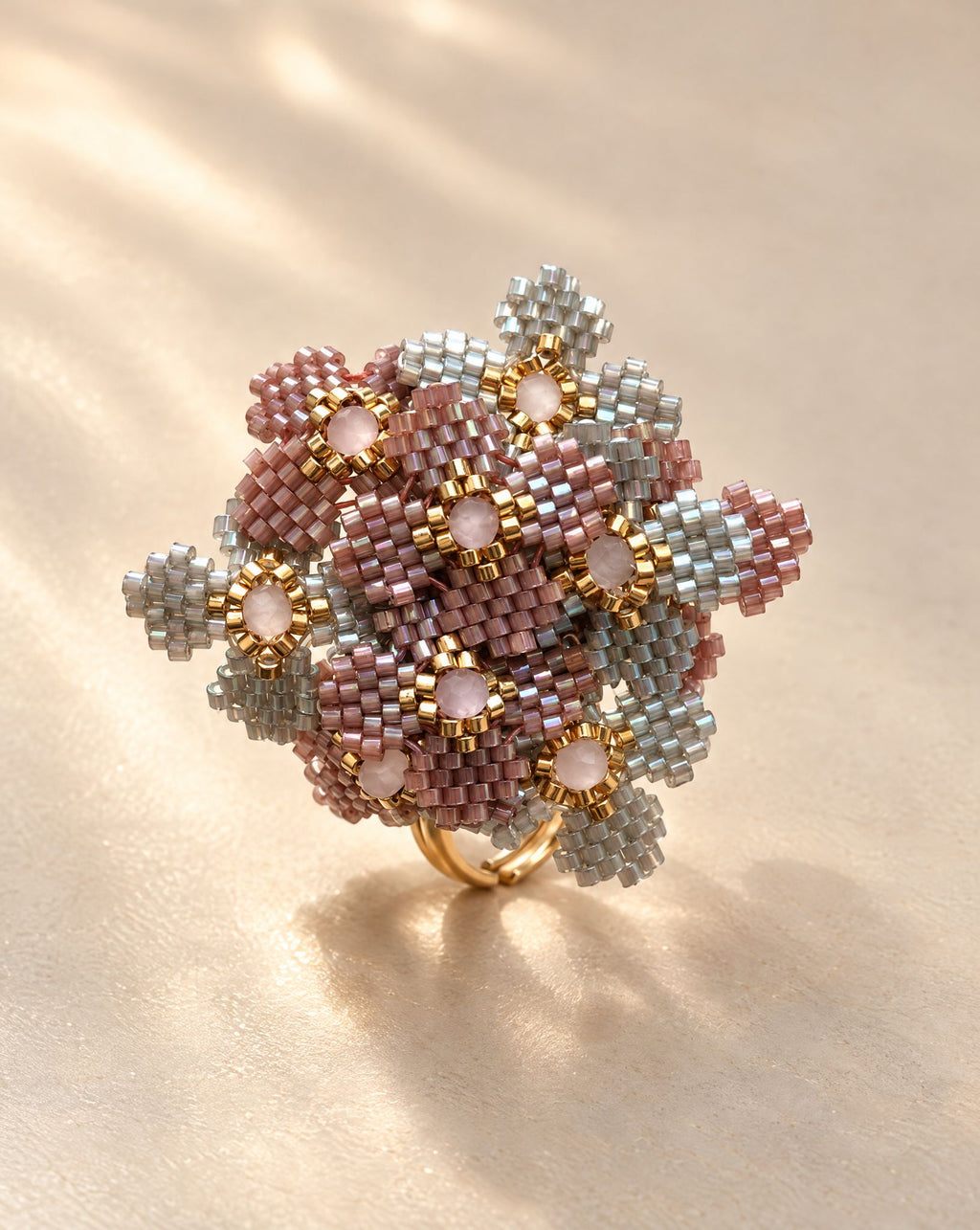 Mil Flores Gris and Violet Ring side view, beaded flower cluster on adjustable gold plated band, handmade by Anne Sidora