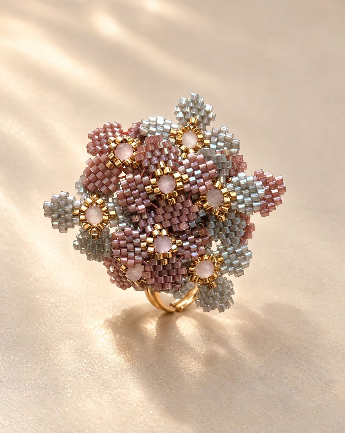 Mil Flores Gris and Violet Ring side view, beaded flower cluster on adjustable gold plated band, handmade by Anne Sidora
