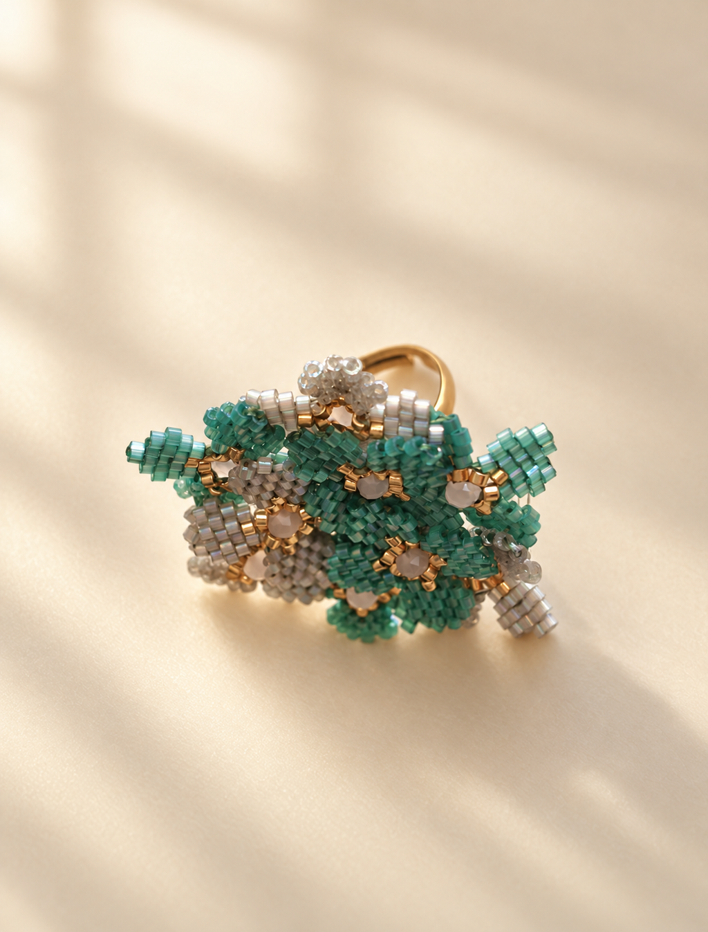 Mil Flores Turquesa Ring side profile, beaded flower cluster on adjustable gold plated band, handmade by Anne Sidora