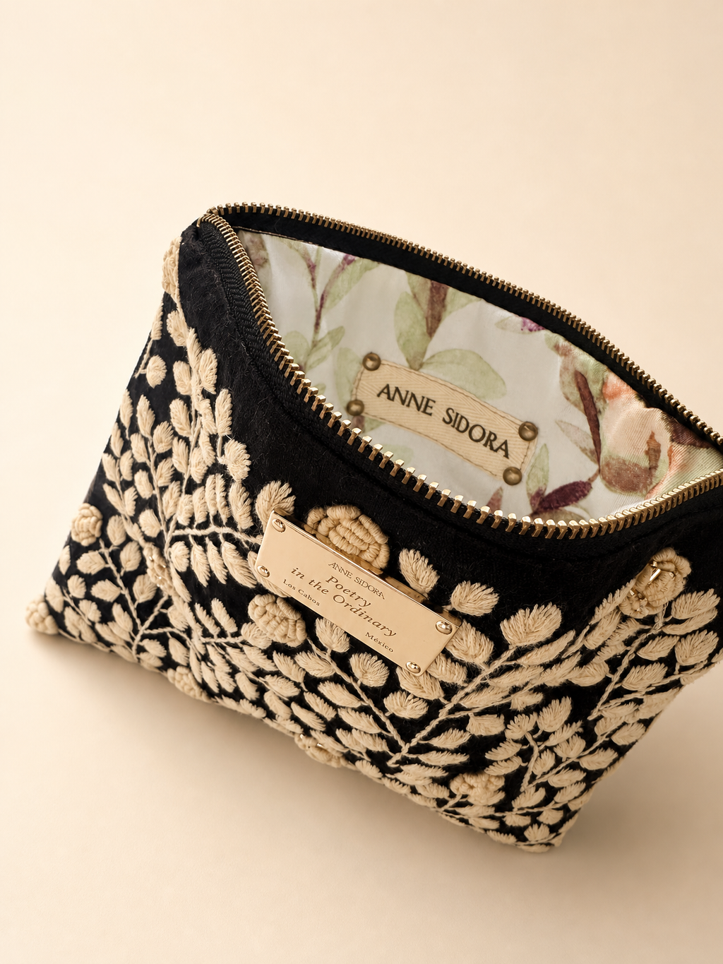 Rosa de Noche embroidered pouch open showing printed cotton lining